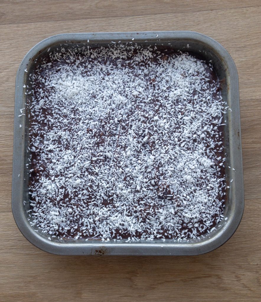 Uncooked brownies with shredded coconut topping