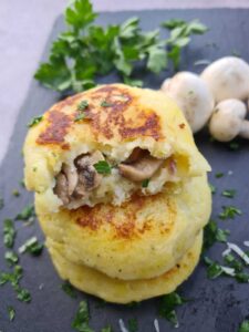 Mushroom stuffed potato cakes